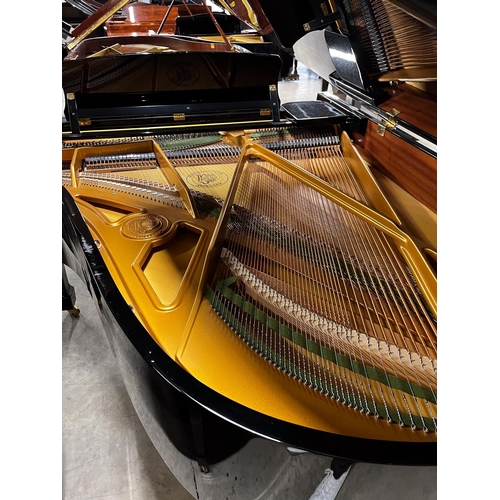 46 - Hoffmann (c2012)A 6ft 1in Model T186 grand piano in a bright ebonised case on square tapered legs.... 