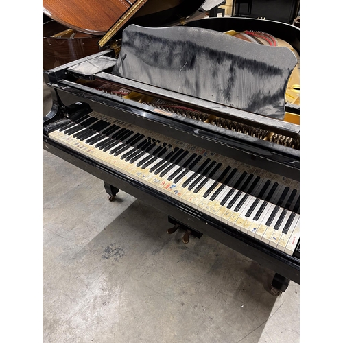 48 - Yamaha (c1986)A 6ft 1in Model C3 grand piano in a bright ebonised case on square tapered legs.