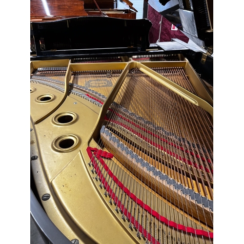 48 - Yamaha (c1986)A 6ft 1in Model C3 grand piano in a bright ebonised case on square tapered legs.