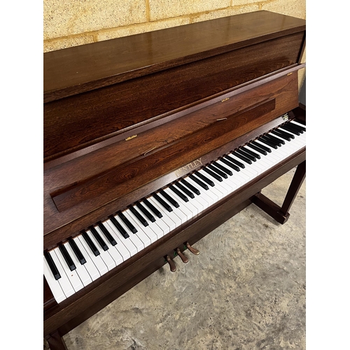 5 - *Bentley (c1980)An upright piano in a traditional satin mahogany case. There is VAT on this Lot.... 
