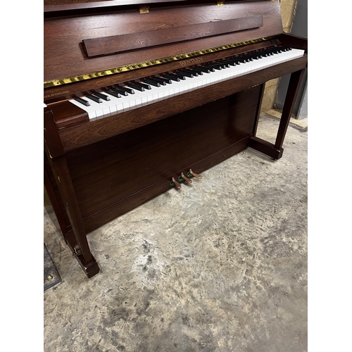 5 - *Bentley (c1980)An upright piano in a traditional satin mahogany case. There is VAT on this Lot.... 