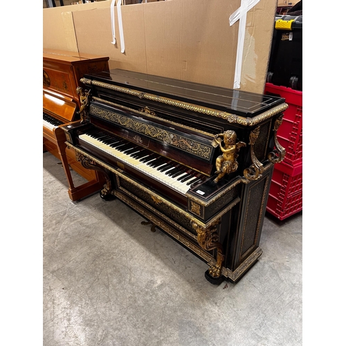 50 - Erard (c1851)An Art cased upright piano in a rosewood and brass Boulle case, decorated with foliate ... 