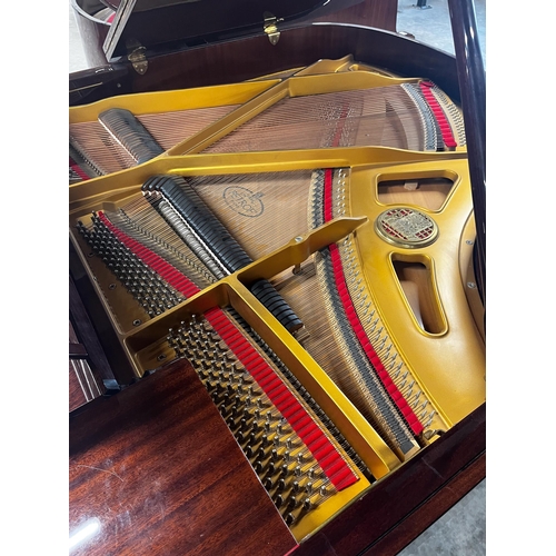 52 - Petrof (c1995)A 5ft 3in Model V grand piano in a bright mahogany case on square tapered legs.