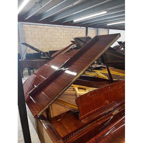 52 - Petrof (c1995)A 5ft 3in Model V grand piano in a bright mahogany case on square tapered legs.