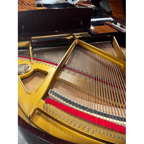 52 - Petrof (c1995)A 5ft 3in Model V grand piano in a bright mahogany case on square tapered legs.