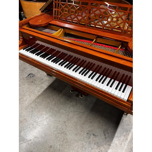 53 - Steinway (c1912)A 5ft 10in Model O grand piano in a satinwood case on square tapered legs. This inst... 