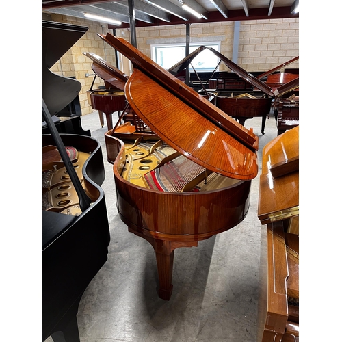 53 - Steinway (c1912)A 5ft 10in Model O grand piano in a satinwood case on square tapered legs. This inst... 