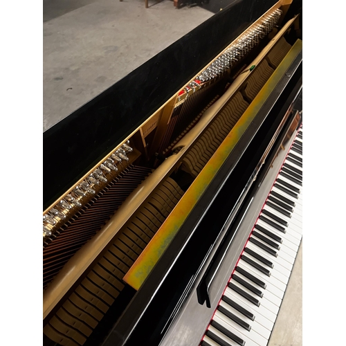 54 - *Essex (c2012)A Model 123 upright piano in a bright ebonised case. There is VAT on this Lot.