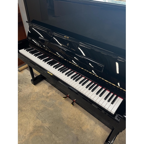 55 - Steinway (c2014)A Model K upright piano in a bright ebonised case.