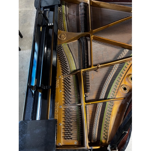 56 - Yamaha (c1957)A 5ft 7in Model G2 grand piano in a bright ebonised case on square tapered legs; toget... 