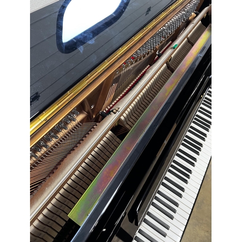 59 - *Essex (c2012)A Model 123 upright piano in a bright ebonised case. There is VAT on this Lot.