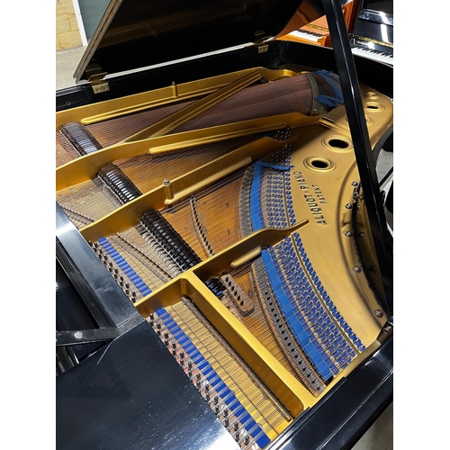 6 - Blüthner (1910)A 6ft 3in grand piano in an ebonised case on turned fluted legs. IRN: 289FFRPV