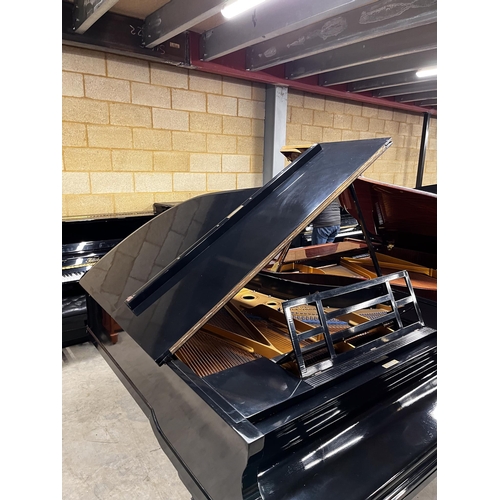 6 - Blüthner (1910)A 6ft 3in grand piano in an ebonised case on turned fluted legs. IRN: 289FFRPV