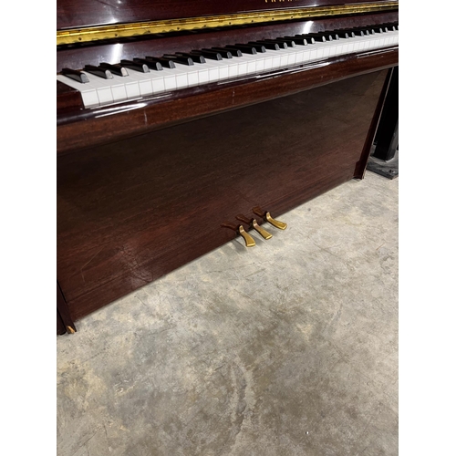 61 - Yamaha (c1998)A Model E116N upright piano in a bright mahogany case; together with a matching stool.... 