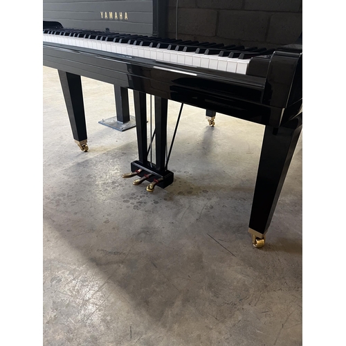 62 - Yamaha (c2012)A 5ft Model GB1K grand piano in a bright ebonised case on square tapered legs; togethe... 