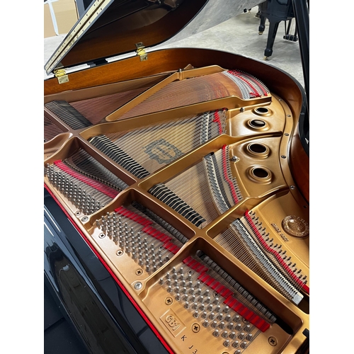 62 - Yamaha (c2012)A 5ft Model GB1K grand piano in a bright ebonised case on square tapered legs; togethe... 