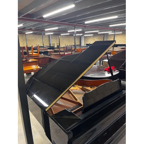 62 - Yamaha (c2012)A 5ft Model GB1K grand piano in a bright ebonised case on square tapered legs; togethe... 