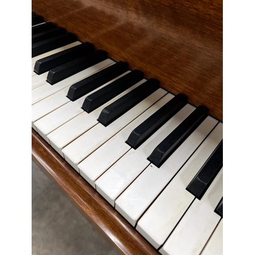 65 - Steinway (c1973)A 6ft 11in Model B grand piano in a mahogany case on square tapered legs; together w... 