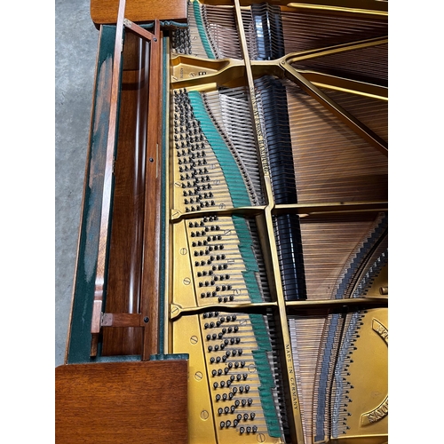65 - Steinway (c1973)A 6ft 11in Model B grand piano in a mahogany case on square tapered legs; together w... 