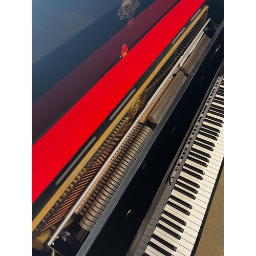7 - Kawai (c1998)A Model CX-5H upright piano in a bright ebonised case; together with an adjustable stoo... 