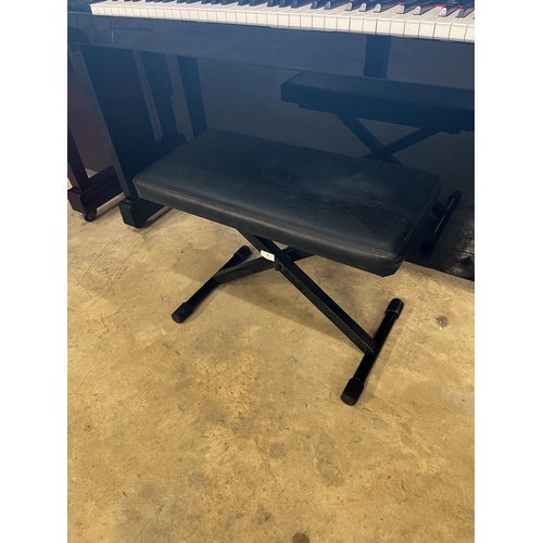 7 - Kawai (c1998)A Model CX-5H upright piano in a bright ebonised case; together with an adjustable stoo... 