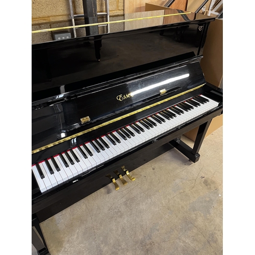 76 - *Essex (c2009)A Model 123 upright piano in a bright ebonised case. There is VAT on this Lot.