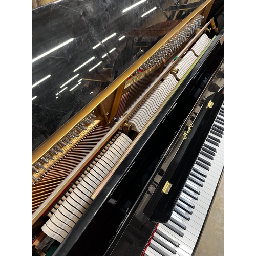 76 - *Essex (c2009)A Model 123 upright piano in a bright ebonised case. There is VAT on this Lot.