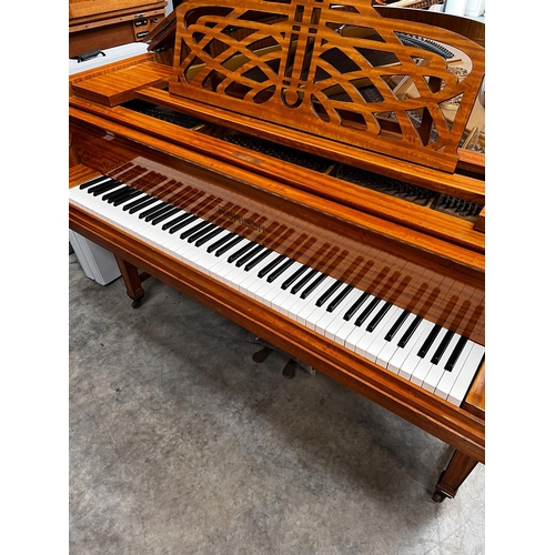 79 - Ronisch (c1909)A 6ft 4in grand piano in a satinwood case on dual square tapered legs. AMENDMENT Is t... 