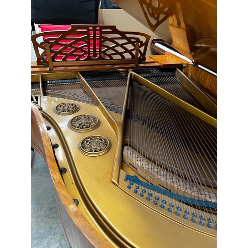 79 - Ronisch (c1909)A 6ft 4in grand piano in a satinwood case on dual square tapered legs. AMENDMENT Is t... 