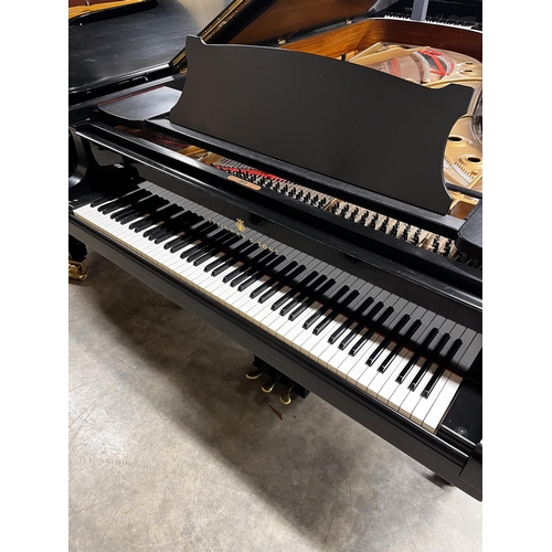 80 - Steinway (c1974)A 7ft 5in Model C grand piano in an ebonised case on square tapered legs. AMENDMENT ... 