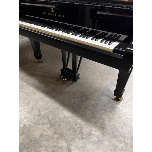 80 - Steinway (c1974)A 7ft 5in Model C grand piano in an ebonised case on square tapered legs. AMENDMENT ... 