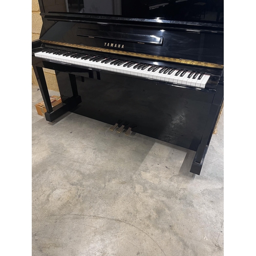 81 - Yamaha (c1991)A Model SX100 RB upright piano in a traditional bright ebonised case with an integral ... 