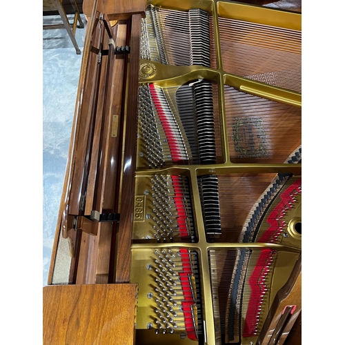82 - Young Chang (c1980)A 6ft Model G185 grand piano in a mahogany case on square tapered legs.