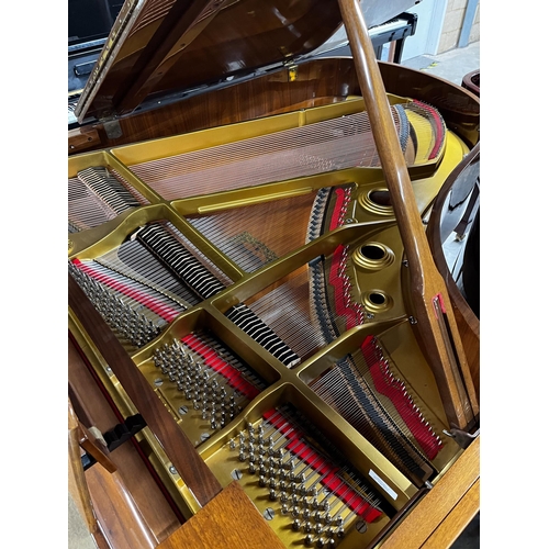 82 - Young Chang (c1980)A 6ft Model G185 grand piano in a mahogany case on square tapered legs.