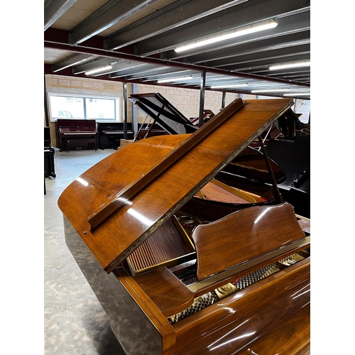 82 - Young Chang (c1980)A 6ft Model G185 grand piano in a mahogany case on square tapered legs.