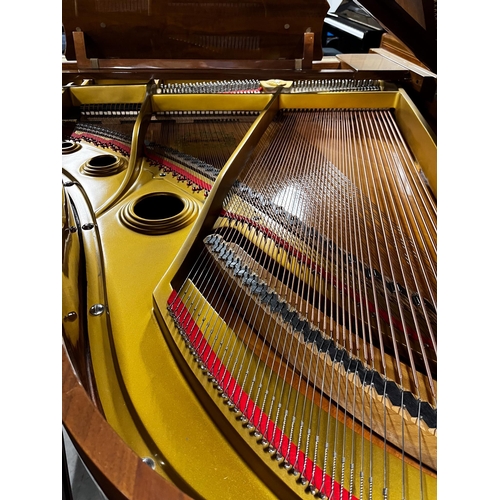 82 - Young Chang (c1980)A 6ft Model G185 grand piano in a mahogany case on square tapered legs.
