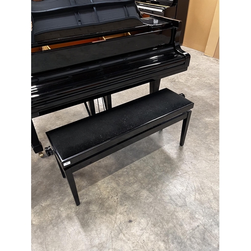 83 - Steinway (c1985)A 6ft 2in Model A grand piano in a bright ebonised case on square tapered legs; toge... 