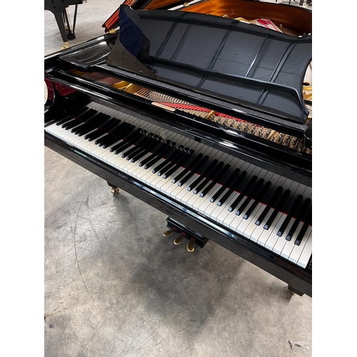 83 - Steinway (c1985)A 6ft 2in Model A grand piano in a bright ebonised case on square tapered legs; toge... 