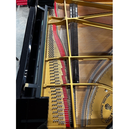 83 - Steinway (c1985)A 6ft 2in Model A grand piano in a bright ebonised case on square tapered legs; toge... 