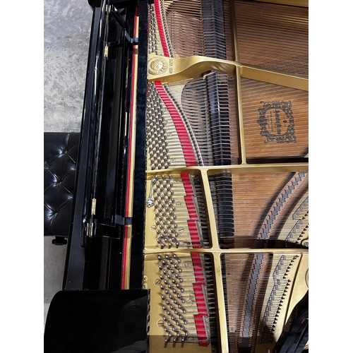 87 - Yamaha (c1980)A 6ft 7in Model C5 grand piano in a bright ebonised case on square tapered legs; toget... 