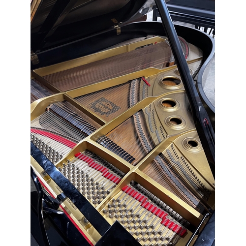 87 - Yamaha (c1980)A 6ft 7in Model C5 grand piano in a bright ebonised case on square tapered legs; toget... 