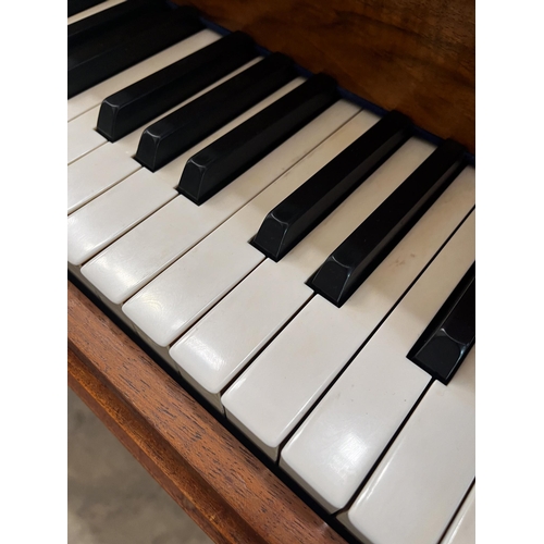 89 - Blüthner (c1936)A 4ft 11in Style 4 grand piano in a walnut case on square tapered legs. IRN: 5V8RTPP... 