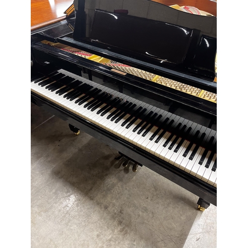92 - Yamaha (c1993)A 6ft 7in Model C5 grand piano in a bright ebonised case on square tapered legs; toget... 