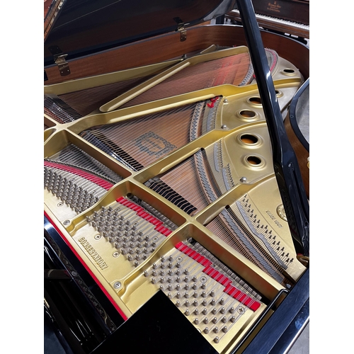 92 - Yamaha (c1993)A 6ft 7in Model C5 grand piano in a bright ebonised case on square tapered legs; toget... 