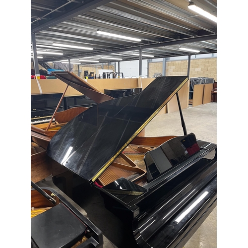 94 - Yamaha (c2009)A 4ft 11in Model GB1K grand piano in a bright ebonised case on square tapered legs; to... 