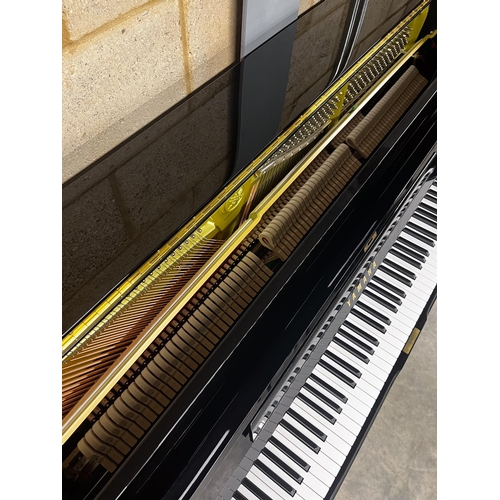 95 - Yamaha (c2022)A Model U1Q upright piano in a bright ebonised case; together with a matching stool. A... 