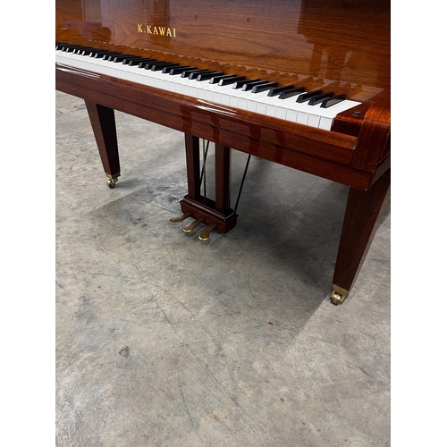 96 - Kawai (c2009)A 5ft 1in Model GE-20 grand piano in a walnut case on square tapered legs; together wit... 