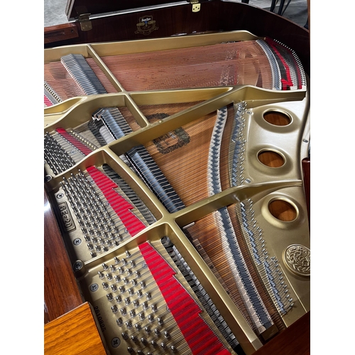 96 - Kawai (c2009)A 5ft 1in Model GE-20 grand piano in a walnut case on square tapered legs; together wit... 