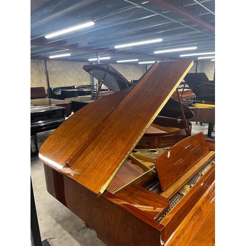 96 - Kawai (c2009)A 5ft 1in Model GE-20 grand piano in a walnut case on square tapered legs; together wit... 