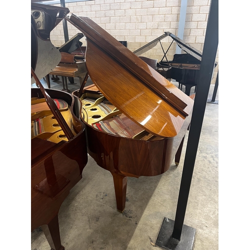 96 - Kawai (c2009)A 5ft 1in Model GE-20 grand piano in a walnut case on square tapered legs; together wit... 